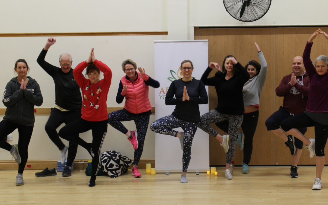 Ad Astra members performing wobbly yoga trees after three and half hours of yoga